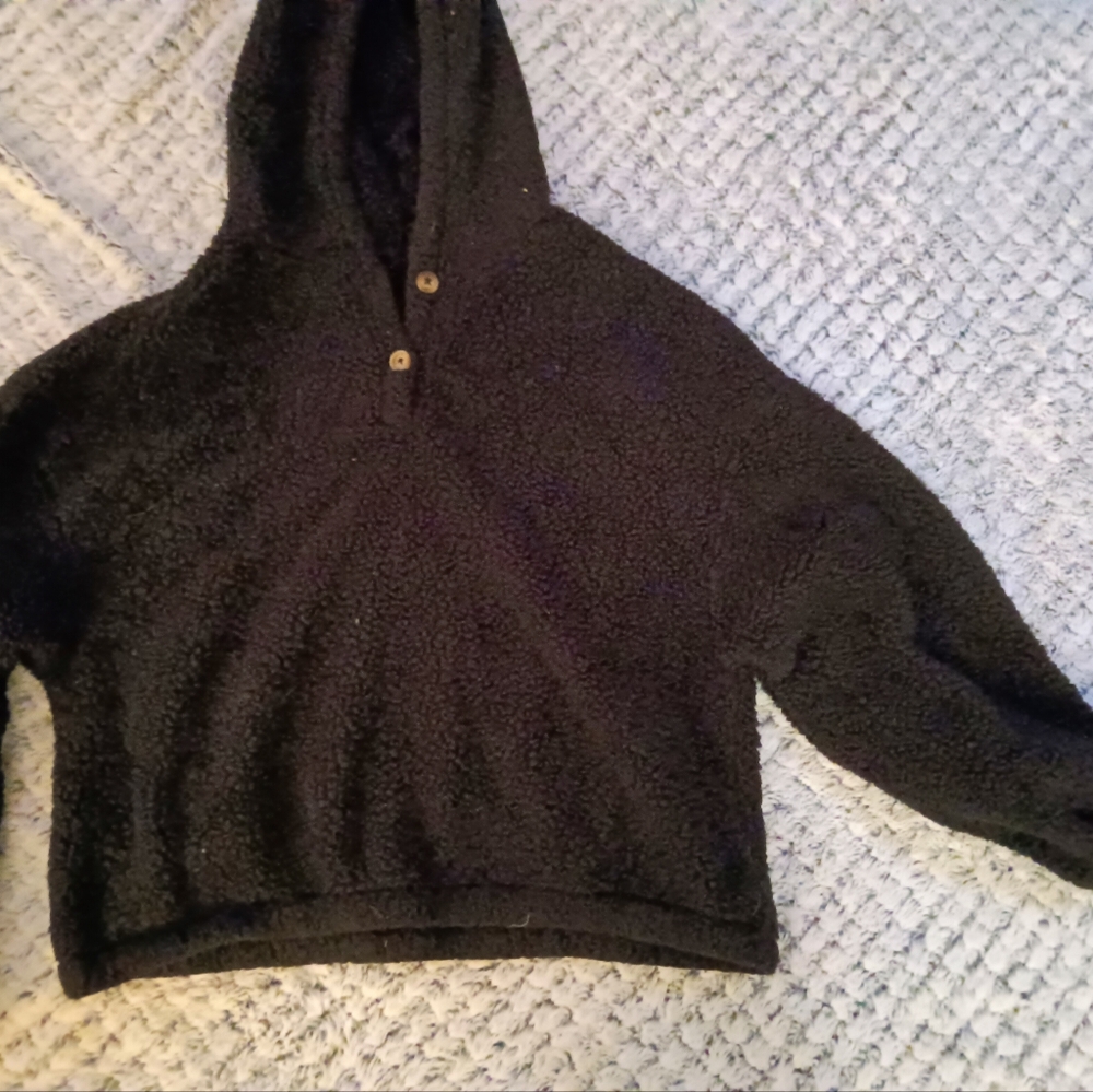Cropped, fuzzy sweater with hood